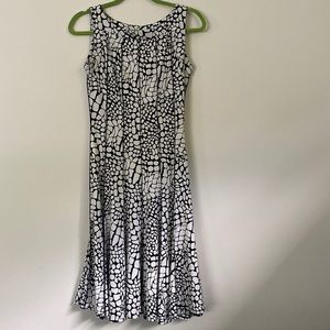 Medium dress. Black and white. Can be worn for work or out. With heels or wedges